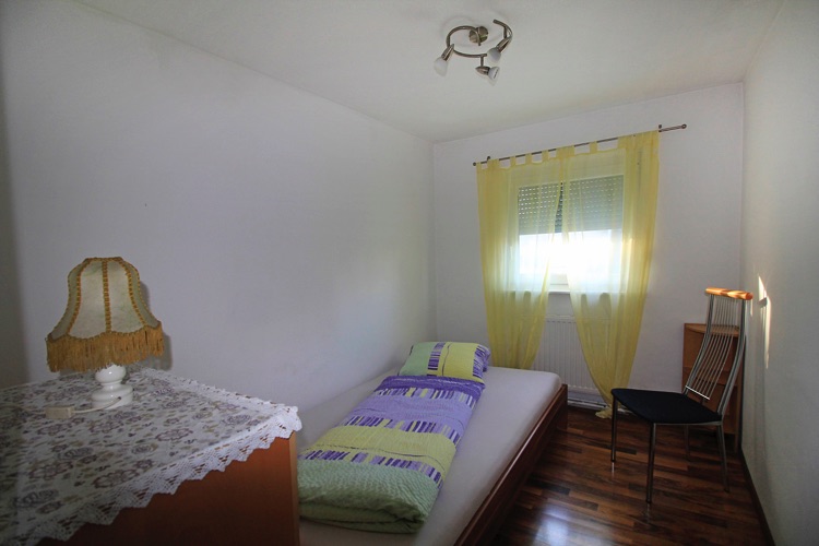 Wohnung Gertrud - Schlafzimmer mit Einzelbett